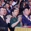 Chủ tịch nước Võ Văn Thưởng, các lãnh đạo, nguyên lãnh đạo Đảng Nhà nước dự Lễ kỷ niệm 60 năm Ngày Bác Hồ về thăm Đảng bộ và nhân dân tỉnh Nam Định. (Ảnh: Thống Nhất/TTXVN)