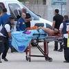 Chuyển người bị thương tại Ashkelon (Israel) trong xung đột giữa Israel và Phong trào Hamas tại Dải Gaza ngày 7/10. (Ảnh: THX/TTXVN)