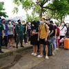 Công dân Việt Nam được trao trả về nước qua Cửa khẩu quốc tế Mộc Bài, hồi tháng 9/2022. (Ảnh: Thanh Tân/TTXVN)