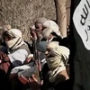 Các tay súng al-Qaeda ở Bán đảo Arab tại một địa điểm bí mật ở Yemen. (Ảnh: AFP/TTXVN)