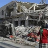 Hiện trường một vụ tấn công ở thủ đô Mogadishu, Somalia. Ảnh: AFP/TTXVN