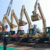 Thiết bị cơ giới tại Lễ Khởi công xây dựng công trình Đường Liên kết Vùng Hoà Bình-Hà Nội và Cao tốc Sơn La đoạn Hoà Bình-Mộc Châu, hồi tháng 2/2023. (Ảnh: Dương Giang/TTXVN)
