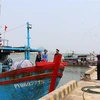 Đoàn Công tác của Bộ Nông nghiệp và Phát triển Nông thôn kiểm tra thực tế tại cảng cá Đông Tác (Phú Yên), tháng 4/2023. (Ảnh: Xuân Triệu/TTXVN)
