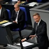 Bộ trưởng Tài chính Đức Christian Lindner (phải) phát biểu trong phiên thảo luận về ngân sách năm 2024 trước Quốc hội ở Berlin, ngày 5/9/2023. (Ảnh: AFP/TTXVN)