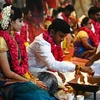Một lễ cưới tập thể tại Chennai (Ấn Độ) ngày 19/11/2023. (Ảnh: AFP/TTXVN)
