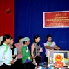 Cử tri xã Cốc San, huyện Bát Xát, tỉnh Lào Cai bỏ phiếu tại khu vực bầu cử số 10. (Ảnh: Hương Thu/TTXVN)