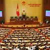 Quốc hội biểu quyết thông qua Nghị quyết bầu Chủ tịch nước với 469 phiếu tán thành (tương ứng 96,70%). (Ảnh: Dương Giang/TTXVN)