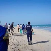 Lực lượng cứu hộ tìm kiếm những người còn sống sót sau hai vụ đắm thuyền chở người di cư ngoài khơi bờ biển ở Godoria, Djibouti, ngày 29/1/2019. (Ảnh: AFP/ TTXVN)