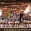 Giây phút đăng quang quẻ vô địch World Cup 2022 group tuyển chọn Argentina. (Ảnh: AFP/TTXVN)