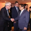 Thủ tướng Phạm Minh Chính với các doanh nghiệp Brazil.(Ảnh: Dương Giang/TTXVN)