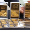 Vàng miếng được trưng bày tại sàn giao dịch vàng ở Seoul, Hàn Quốc. (Ảnh: AFP/TTXVN)