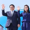 Thủ tướng Phạm Minh Chính và Phu nhân kết thúc chuyến tham dự Hội nghị COP28 tại UAE. (Ảnh: Dương Giang/TTXVN)