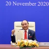 Thủ tướng Nguyễn Xuân Phúc và lãnh đạo các nền kinh tế thành viên thông qua Tầm nhìn APEC Putrajaya 2040. (Ảnh: Thống Nhất/TTXVN)