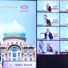 Thủ tướng Nguyễn Xuân Phúc và lãnh đạo các nền kinh tế thành viên thông qua Tầm nhìn APEC Putrajaya 2040. (Ảnh: Thống Nhất/TTXVN) 