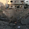 Một tòa nhà bị phá hủy khi máy bay Israel oanh tạc thành phố Khan Younis ở Dải Gaza. (Ảnh: THX/TTXVN)