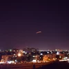 Lực lượng phòng không Syria đánh chặn tên lửa do Israel phóng xuống sân bay Damascus. (Ảnh: AFP/TTXVN)