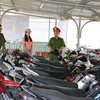Xe máy tang vật được Công an huyện Phước Long thu giữ. (Ảnh: TTXVN phát)