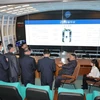 Nhà lãnh đạo Triều Tiên Kim Jong-un (thứ 2, phải) thị sát Cơ quan Phát triển hàng không vũ trụ quốc gia tại Bình Nhưỡng, ngày 18/4. (Ảnh: Yonhap/TTXVN) 