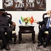 Chủ tịch nước Nguyễn Xuân Phúc gặp Tổng thống Sierra Leone Julius Maada Bio bên lề Phiên thảo luận chung cấp cao Đại hội đồng Liên hợp quốc khóa 76, chiều 23/9/2021, tại New York của Hoa Kỳ. (Ảnh: Thống Nhất/TTXVN)