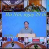 Thủ tướng phát biểu tại Hội nghị tổng kết công tác phòng, chống dịch COVID-19, diễn ra tại Hà Nội và trực tuyến đến các tỉnh, thành phố ngày 29/10 vừa qua. (Ảnh: Dương Giang/TTXVN)
