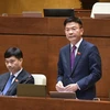Bộ trưởng Bộ Tư pháp Lê Thành Long phát biểu giải trình, làm rõ một số vấn đề đại biểu Quốc hội nêu về dự án Luật sửa đổi, bổ sung một số điều của Luật Đấu giá tài sản. (Ảnh: CTV/Vietnam+)