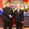 Tổng Bí thư, Chủ tịch nước Nguyễn Phú Trọng đón Chủ tịch Triều Tiên Kim Jong-un. (Ảnh: Doãn Tấn/TTXVN) 
