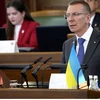 Ông Edgars Rinkevics phát biểu trước Quốc hội Latvia ngày 31/5/2023. (Nguồn: Reuters)