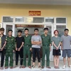 Nhóm đối tượng xuất cảnh trái phép sang Lào bị bắt quả tang tại Hướng Hóa, Quảng Trị. (Nguồn: Báo Lao động)