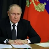 Tổng thống Nga Vladimir Putin phát biểu tại cuộc họp ở Moskva. (Ảnh: AFP/TTXVN)