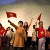 Các học sinh trường Bình Minh trình diễn ca khúc "Việt Nam trong tôi là." (Ảnh: Anh Hiển/Vietnam+)