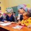 [Photo] Lớp học xóa mù chữ buổi tối cho đồng bào Mù Cang Chải