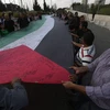 Palestine: Quốc kỳ 25.000 chữ ký biểu trưng tinh thần dân tộc