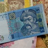 Ukraine: Đồng hryvnia mất giá xuống mức thấp kỷ lục mới 