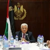 Tổng thống Palestine Mahmud Abbas (giữa) chủ trì cuộc họp với Ủy ban hành pháp Tổ chức Giải phóng Palestine (PLO). (Nguồn: AFP/TTXVN)