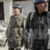 Chiến binh người Kurd tại trung tâm thị trấn Kobane. (Ảnh AFP/TTXVN)