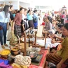 Hội chợ Hàng thủ công mỹ nghệ Lào lần thứ 14. (Ảnh: Phạm Kiên/TTXVN)