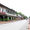 Đi bộ trên những con phố cổ của Luang Prabang là một thú vui khó cưỡng của du khách. (Ảnh: Phạm Kiên/Vietnam+)