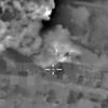 Không quân Nga không kích trúng một mục tiêu IS tại thành phố Aleppo, Syria. (Nguồn: AFP/TTXVN)