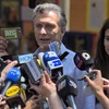 Ông Mauricio Macri trả lời báo giới sau cuộc bầu cử ở Buenos Aires ngày 22/11. (Ảnh: AFP/TTXVN)