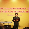 ​Lễ kỷ niệm 71 năm ngày thành lập Quân đội Nhân dân Việt Nam tại Lào. (Ảnh: Phạm Kiên/Vietnam+)