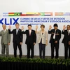 Lãnh đạo các nước thành viên MERCOSUR chụp ảnh chung tại hội nghị. (Ảnh: THX/TTXVN)