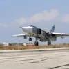 Máy bay Sukhoi SU-24 của Nga tại căn cứ không quân Hmeimim ở tỉnh Latakia, Syria ngày 3/10. (Nguồn: AFP/TTXVN)