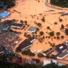 Cảnh ngập lụt tại Itapevi, ngoại ô Sao Paulo. (Ảnh: AFP/TTXVN)
