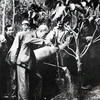 Chủ tịch Hồ Chí Minh tham gia 'Tết trồng cây' với nhân dân xã Vật Lại, Ba Vì, Hà Tây (nay thuộc ngoại thành Hà Nội) ngày 16/2/1969. (Ảnh: Tư Liệu)