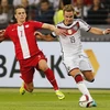 Đức và Ba Lan sẽ có dịp tái ngộ ở vòng chung kết EURO 2016. (Nguồn: AP)