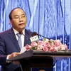 Thủ tướng Nguyễn Xuân Phúc dự Hội nghị xúc tiến đầu tư Hà Nội. (Ảnh: Thống Nhất/TTXVN)