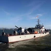  Tàu HQ211 rời cầu cảng Hải đội 2 (Bộ đội Biên phòng tỉnh Nghệ An). (Ảnh: Thanh Tùng/TTXVN)