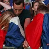 Nỗi buồn của cổ động viên Pháp sau trận chung kết EURO 2016. (Nguồn: Reuters)