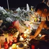 Tưởng nhớ các nạn nhân xấu số trong vụ tấn công ở Nice hôm 14/7. (Nguồn: Reuters)