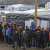 Người di cư ở trại di cư thuộc thành phố Calais, Pháp. (Nguồn: Reuters)